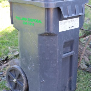 yard waste bin with green logo